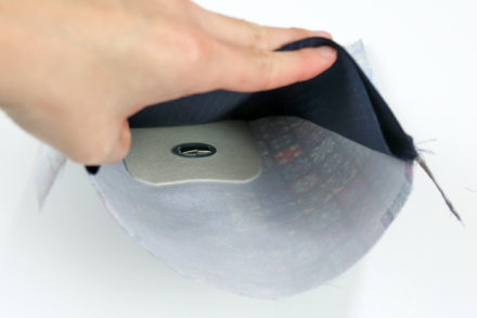 Mocowanie dolnej części zapięcia obrotowego w torebce